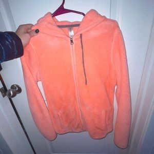 Bright orange fleece jacket